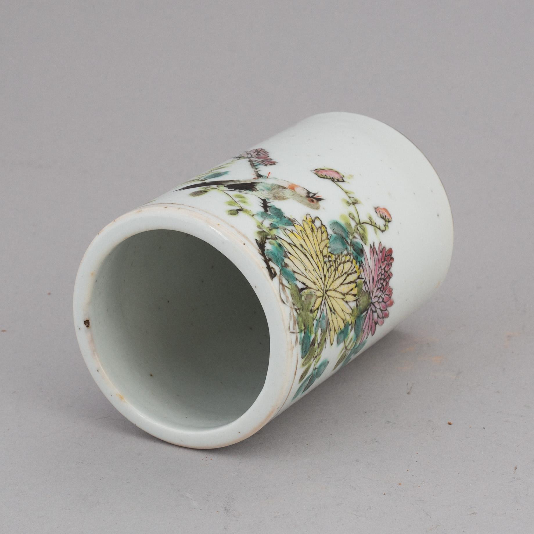 A famille rose brush pot, Qing dynasty, signed Lü Shangwen and dated 1900.