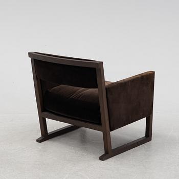 A 'Musa' easy chair by Antonio Citterio for Maxalto, designed 2006.
