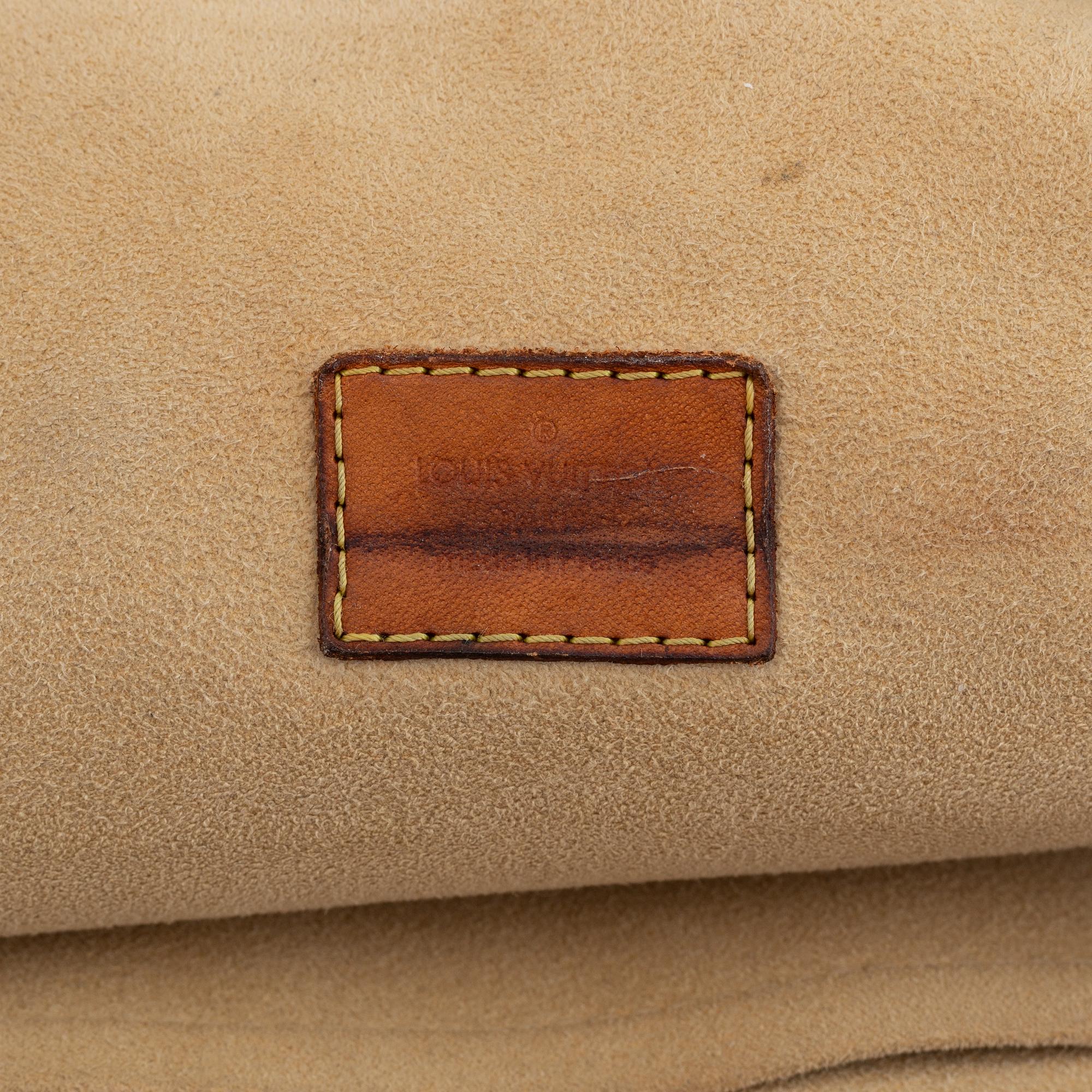 Louis Vuitton, a monogram canvas handbag.