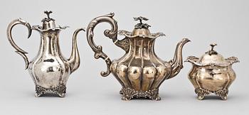 SERVISDELAR, 3 st, silver, bl a Gustav Möllenborg Feron, Stockholm, 1857, 1865 resp 1910. Totalvikt 2339.