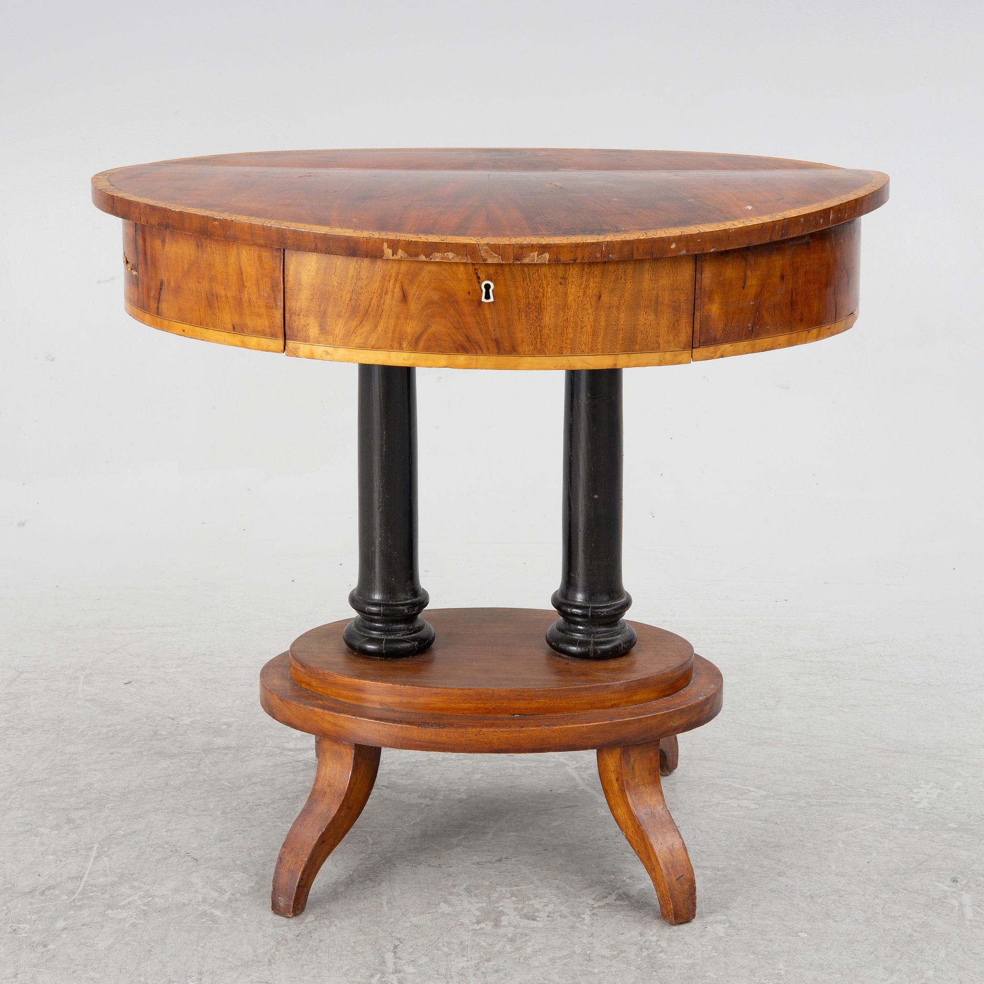An Empire sewing table, mid-19th Century.