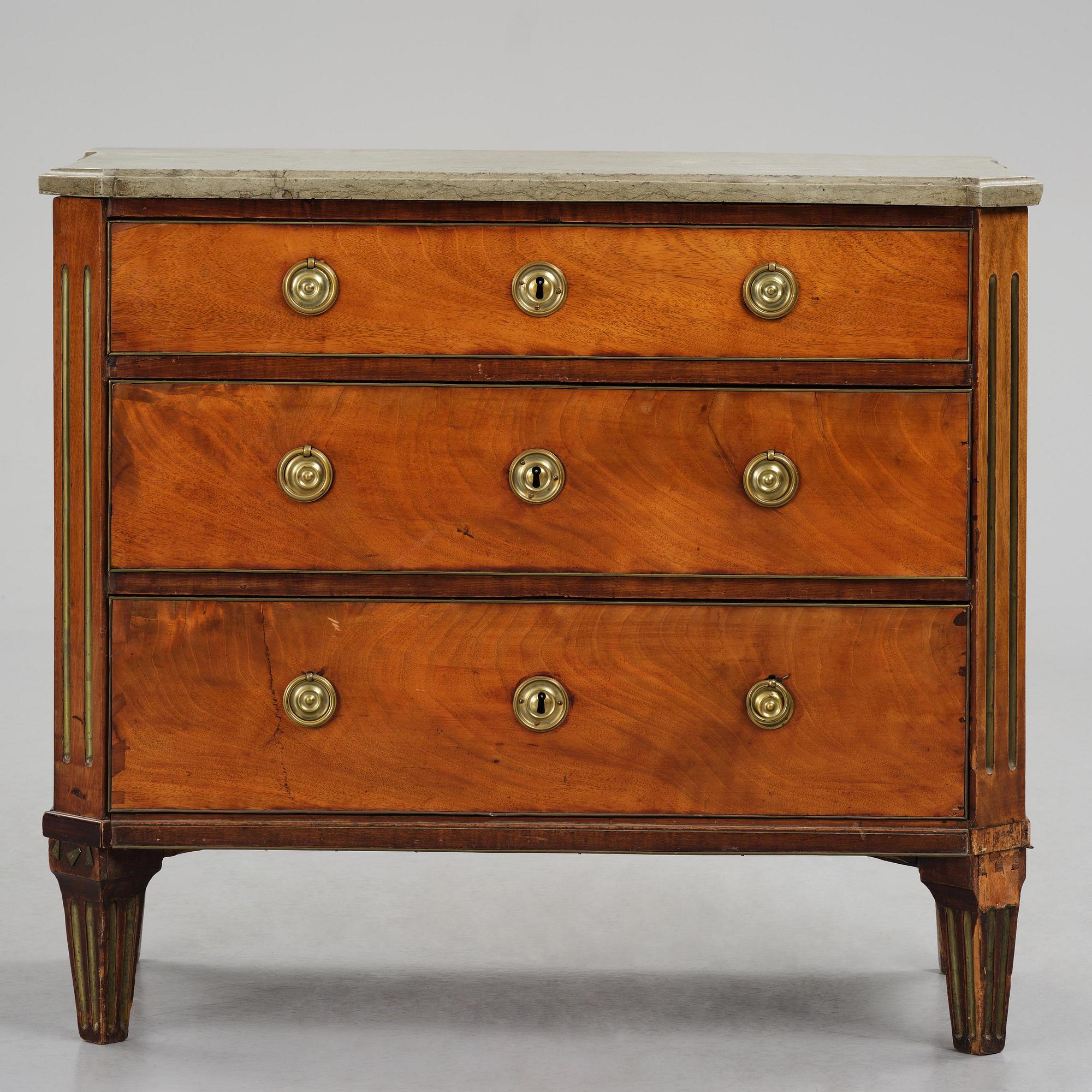 A late Gustavian mahogany commode by Erik Nyström (master in Stockholm 1773-88).