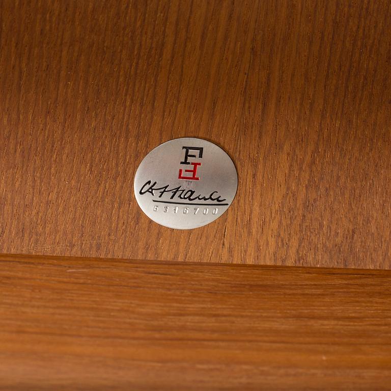 GRETE JALK, a teak coffee table fron France, Denmark, 1963.