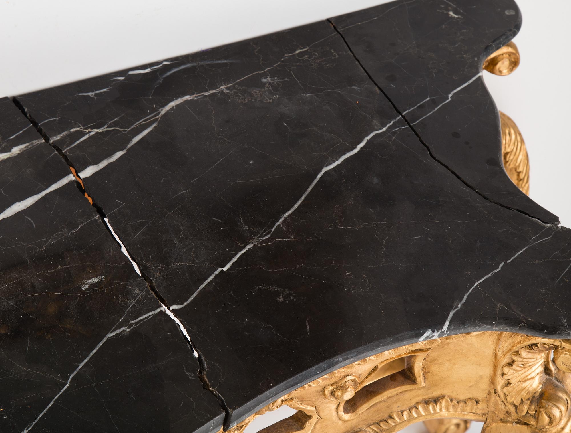 A later part of the 20th century mirror and consol table.