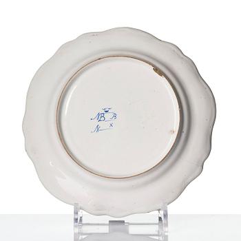 A Swedish Marieberg faience dinner plate, 18th century.