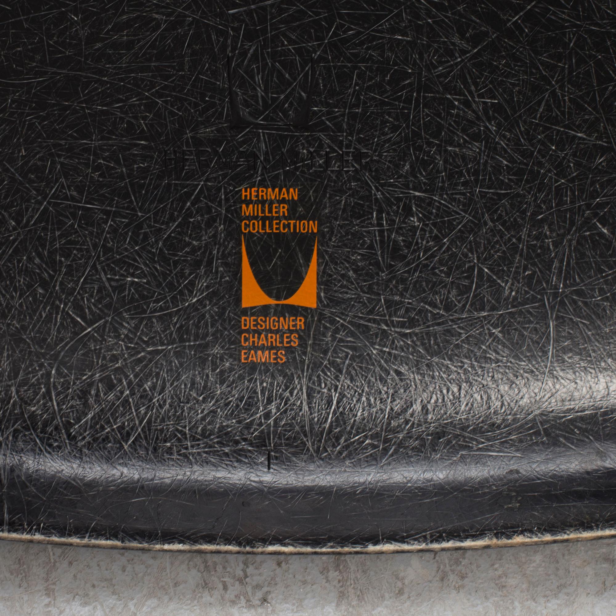 A 'Rocket chair' by Charles & Ray Eames, Herman Miller, late 20th century.