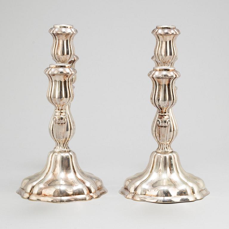 a pair of silver candelabras by K Andersson Gothenburg 1938.