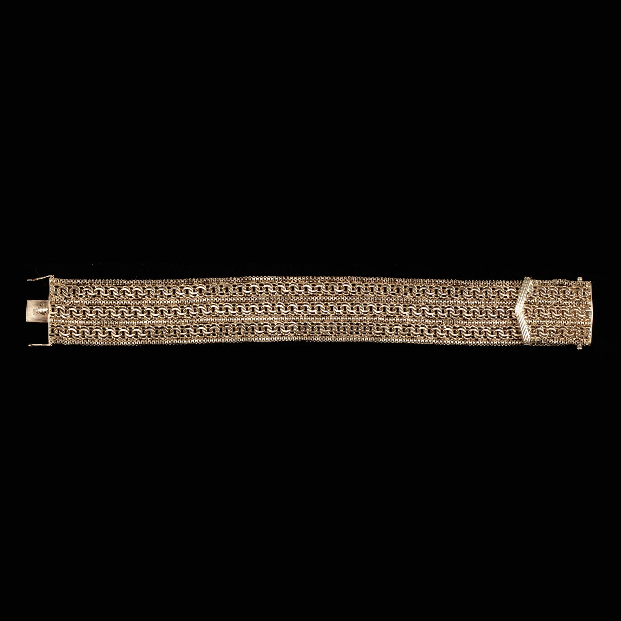 ARMLÄNK, 18k guld. Vikt ca 69 gram.