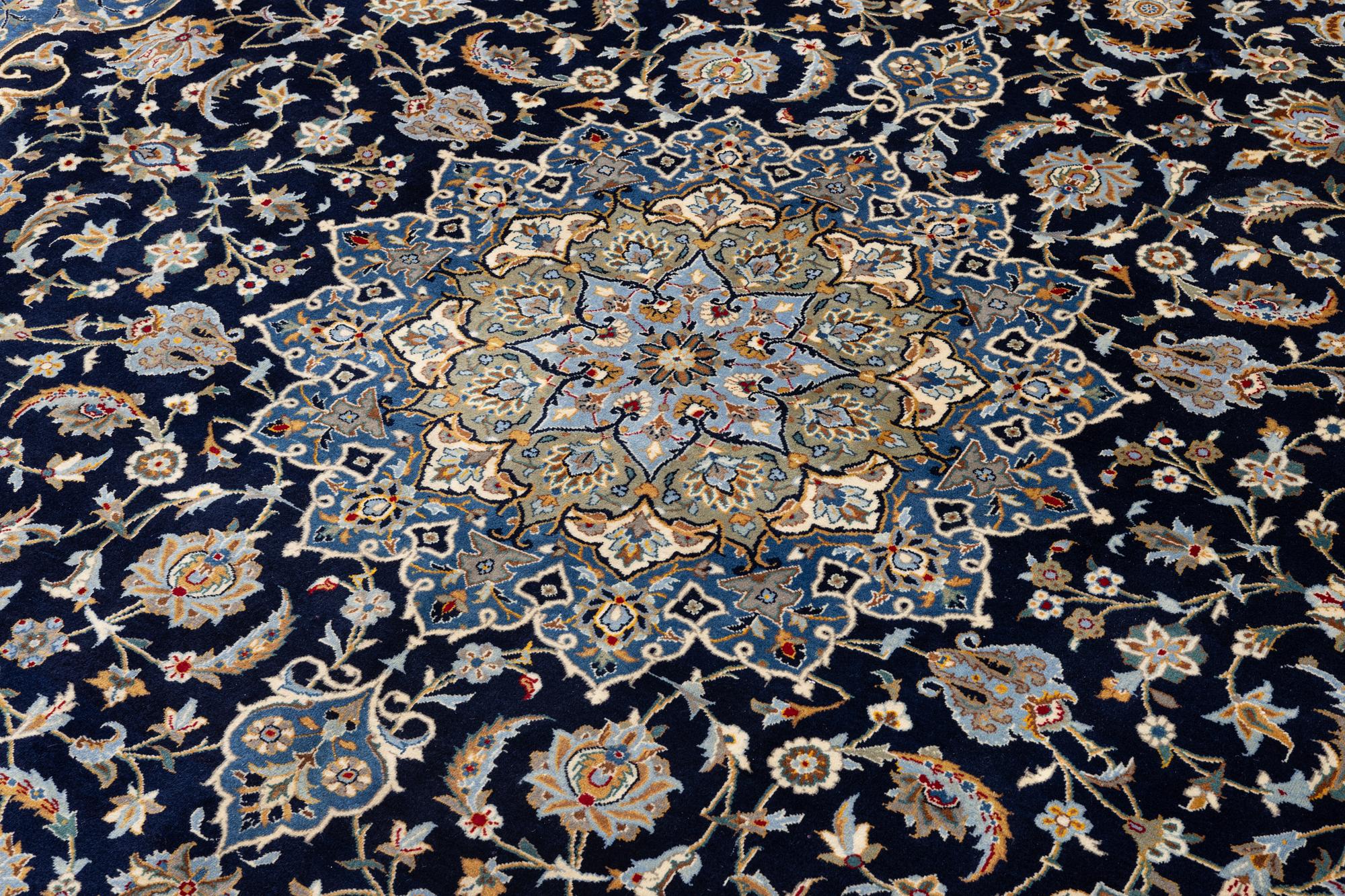 A Royal Keshan carpet, signed, c. 395 x 295 cm.