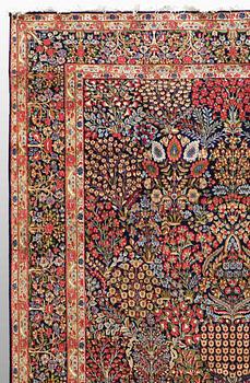 A carpet, Kerman, around  408 x 300 cm.