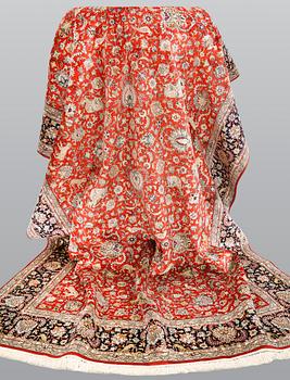 A pictoral orientalisk silk carpet, ca 284 x 180 cm.