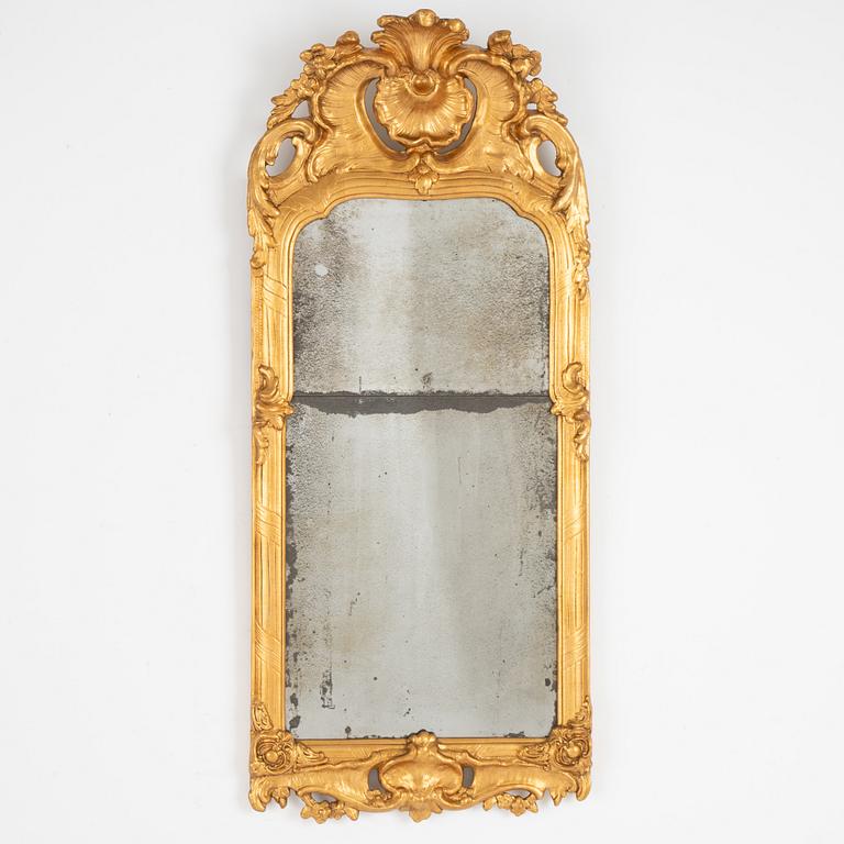 A Rococo mirror, later part of the 18th century.