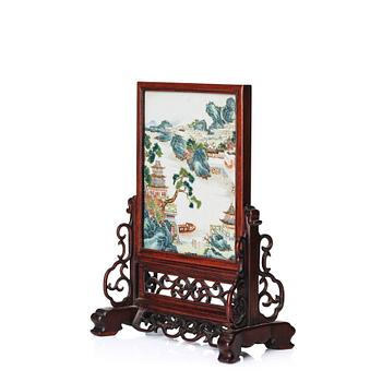 A famille rose table screen in a wooden stand, Qing dynasty, 19th Century.