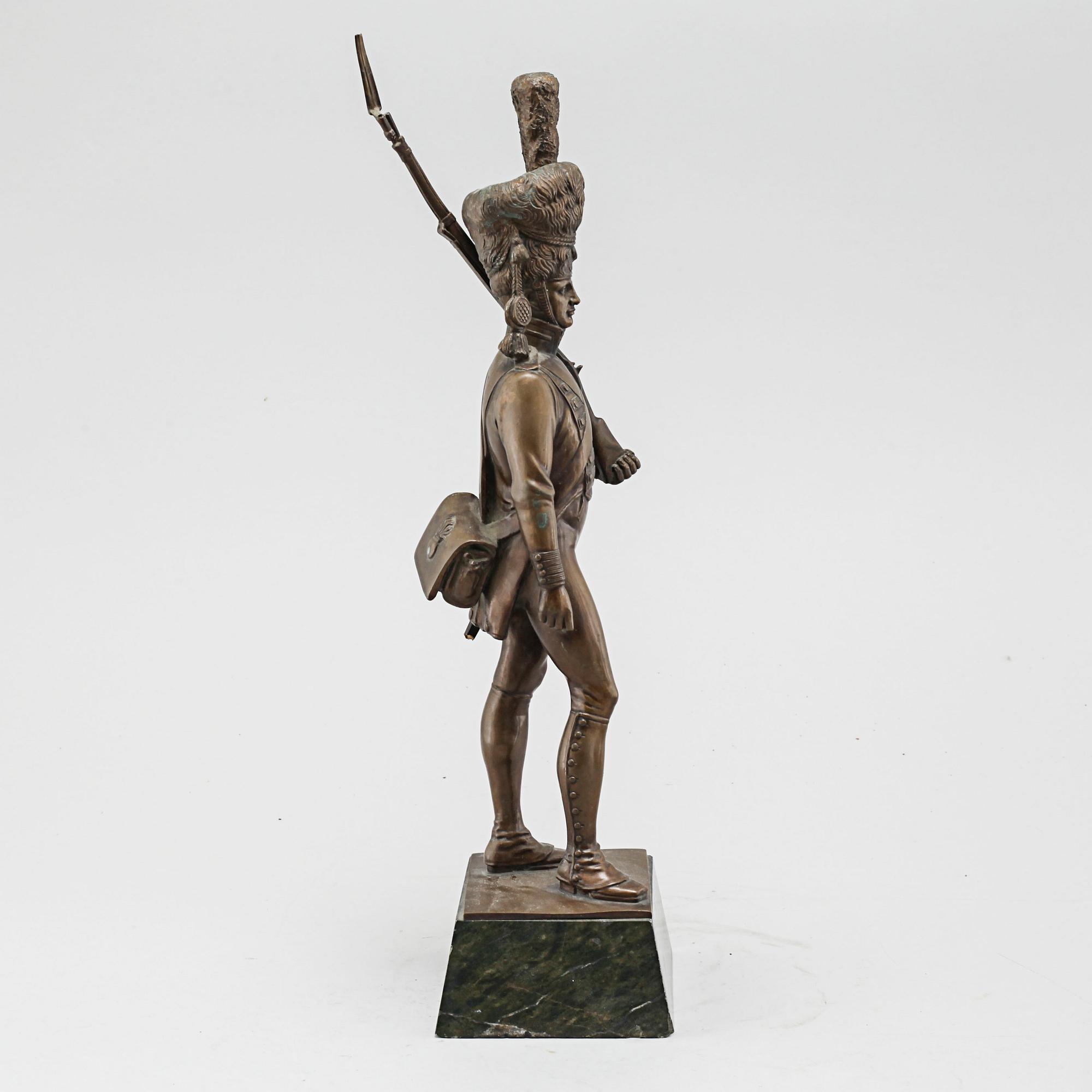 after, patinated bronze, signed.