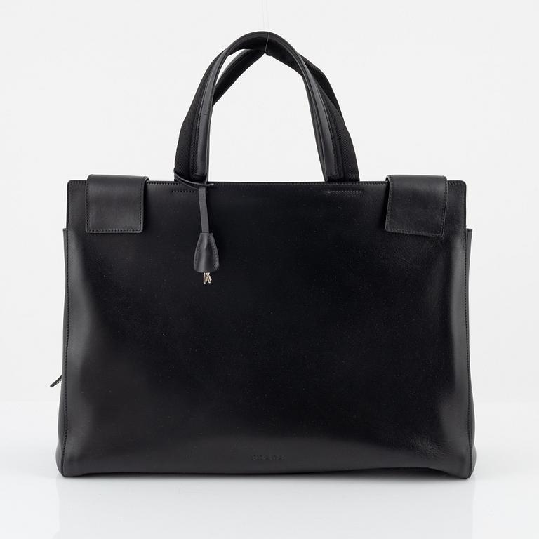 Prada, a black leather bag.