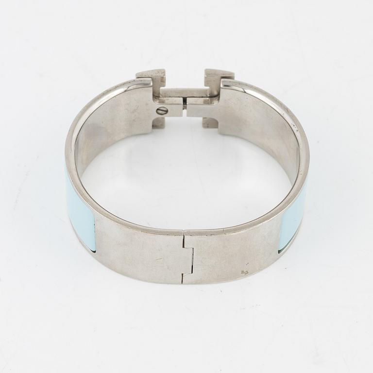 Hermès, a 'Clic Clac H' bracelet.