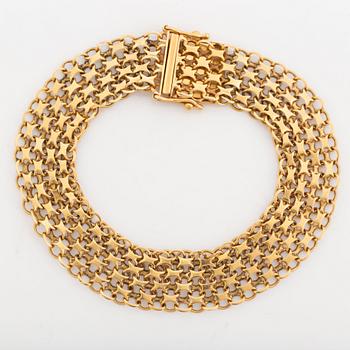 18K gold bracelet.
