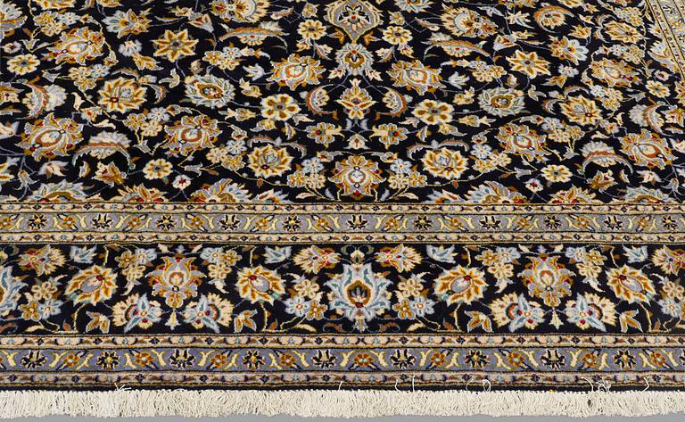 A carpet, Keshan approx. 410 x 310 cm.