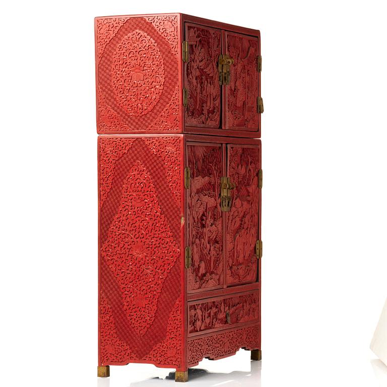 A carved  lacquer 'Kang'Cabinet, Qing dynasty, 18/19th Century.