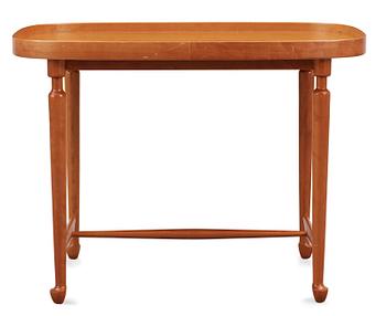 A Josef Frank mahogany table by Svenskt Tenn.