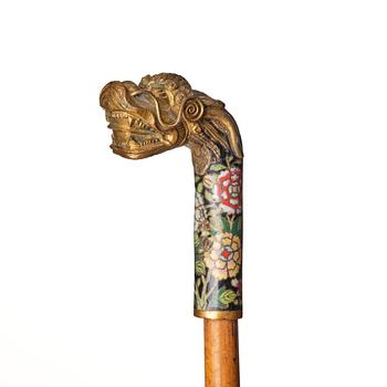 A Chinese bamboo walking cane with a cloisonné handle, late Qing dynasty/early 20th Century.