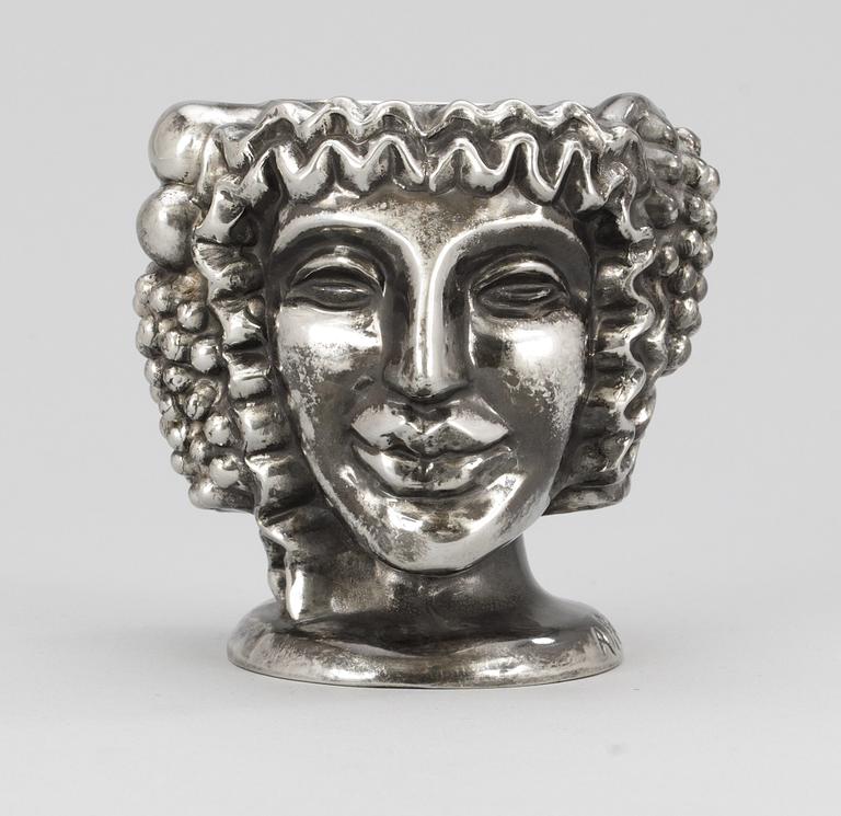 An Anna Petrus "Janus head" pewter vase, Firma Svenskt Tenn 1984.