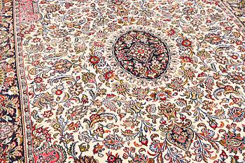 A Quum rug, c. 204 x 134 cm.