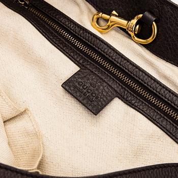 Gucci, an "Interlocking G" bag.