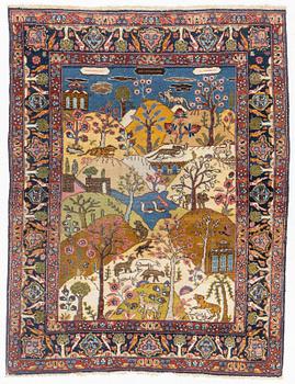 A pictorial semi-antique Tabriz rug, c 180 x 140 cm.