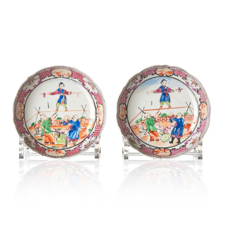 A pair of famille rose dishes with entertainers, Qing dynasty, Qianlong (1736-95).