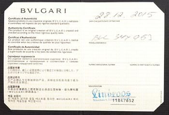 BULGARI, An 18K gold ring "Parentesi" with a green quartz and ca. 0.70 ct of  brilliant cut diamonds in total.