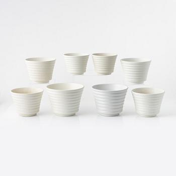 Wilhelm Kåge, eight ceramic pots, Gustavsberg, Sweden.