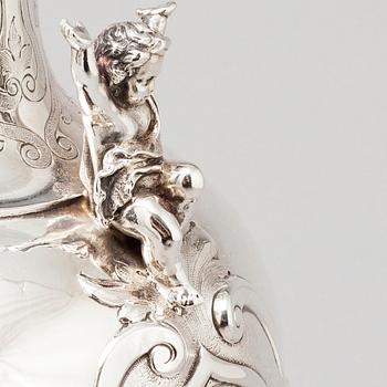 An English 19th century silver wine-jug, mark of Joseph Angle, London 1860.