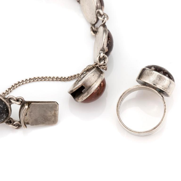 A silver bracelet and ring set with round, cabochon-cut porphyry.