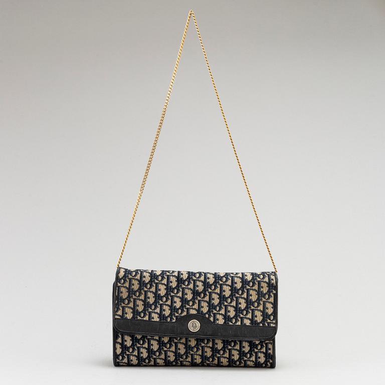 CHRISTIAN DIOR, a set of a clutch, a belt and an umbrella.