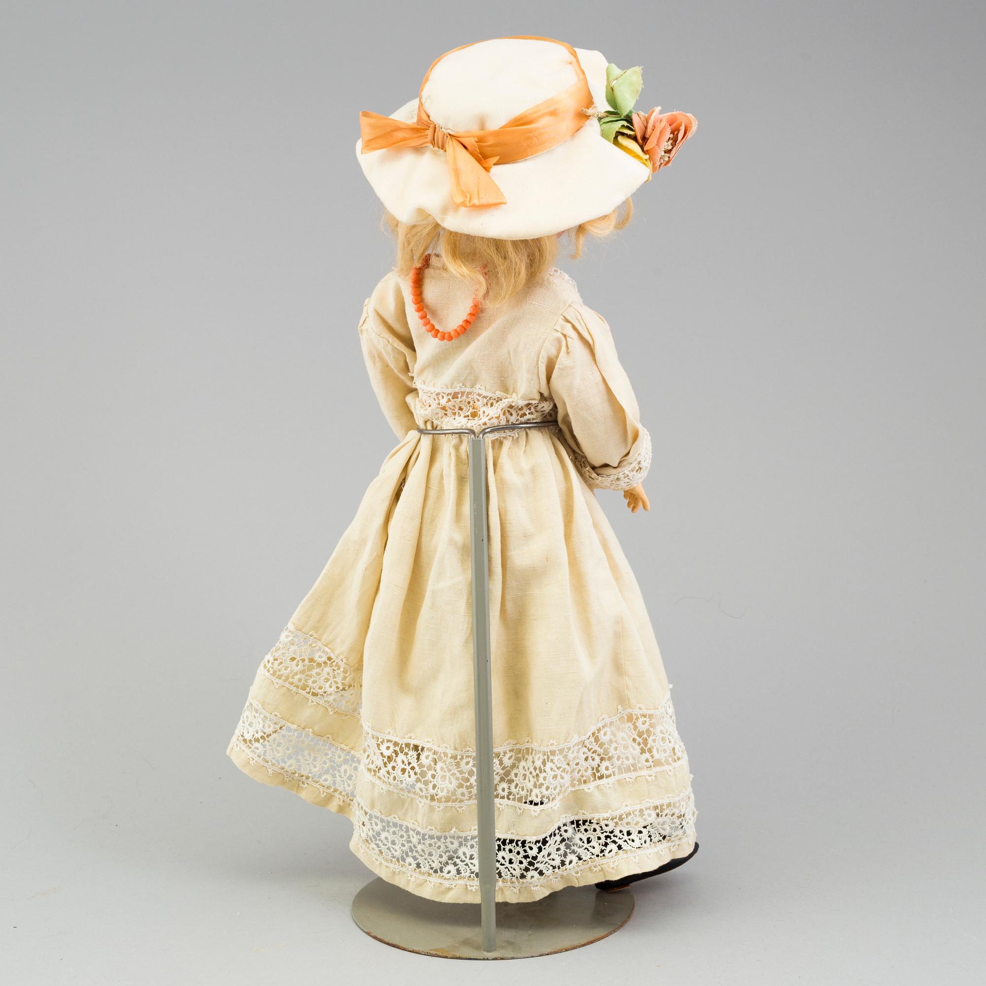 a Franz Schmidt & Co porcellain doll from the early 20th century.