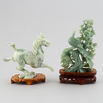 Two Chinese green stone figurines, 20th century.
