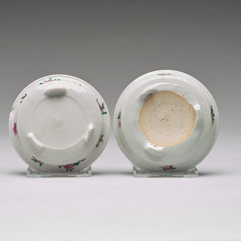 A set of four (2+2) famille rose flower pots with stands, Qing dynasty, Qianlong (1736-95).