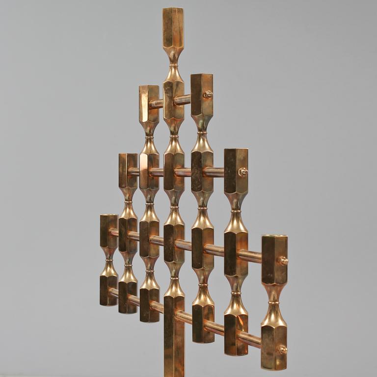GOLVLJUSSTAKE, mässing, Gusum, 1900-talets fjärde kvartal.