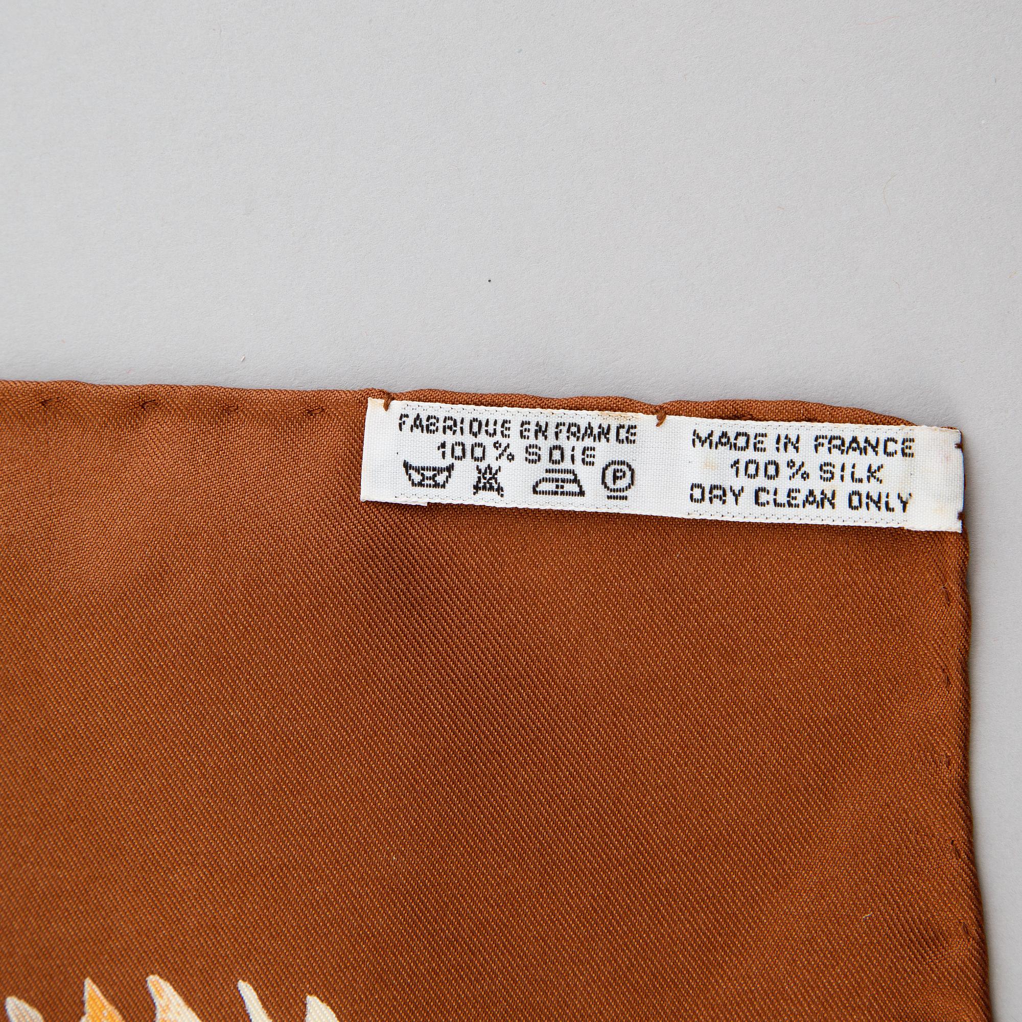 Hermès, an 'Africa' silk scarf.