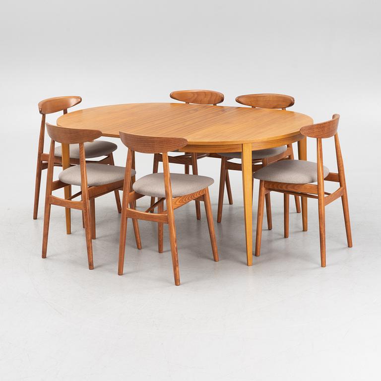 A dining table and six chairs, 1950's/60's.