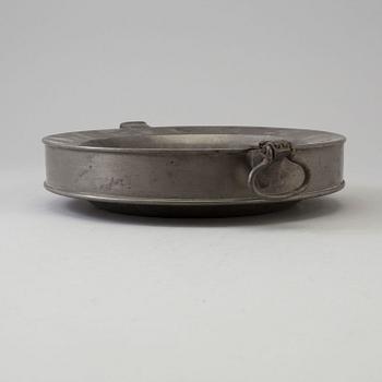 A 19th century pewter plate.