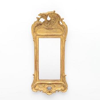 A giltwood rococo mirror, Stockholm, later part 18th century.