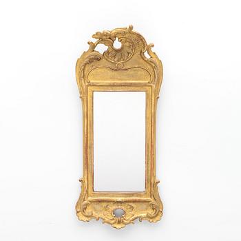 A giltwood rococo mirror, Stockholm, later part 18th century.