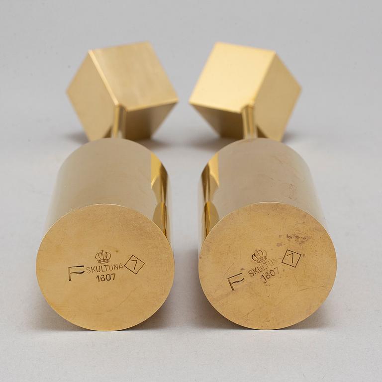PIERRE FORSSELL, a pair of brass candlesticks, Skultuna.