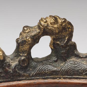 A bronze brush rest, Ming dynasty (1368-1644).