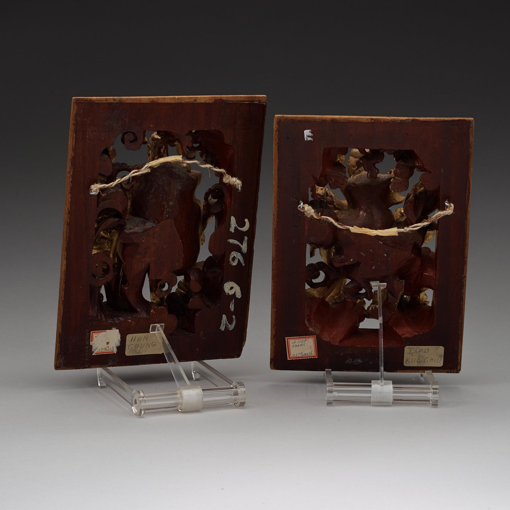 Two wooden carwings in red laquer and with gilding, late Qing dynasty.