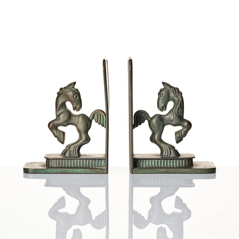 Carl-Einar Borgström, a pair of patinated bronze bookends, Ystad Brons, 1930-40s.