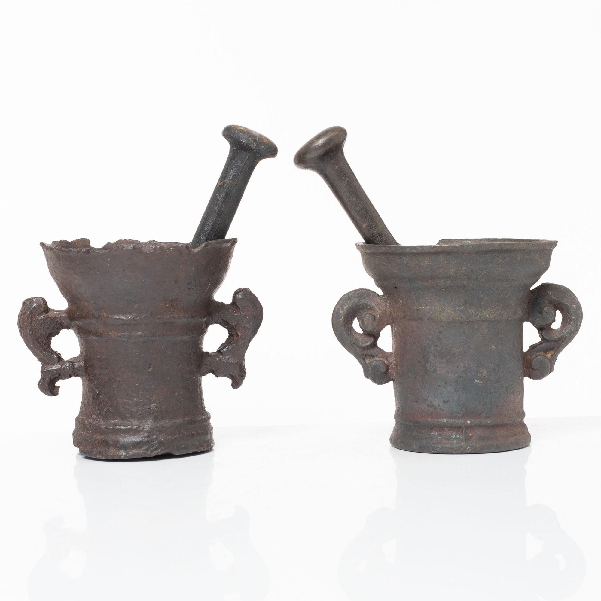 A set of two renaissance-type cast-iron mortars, 17th century.