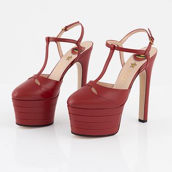 Gucci, a pair of red leather high heel shoes, 2016, size 37.
